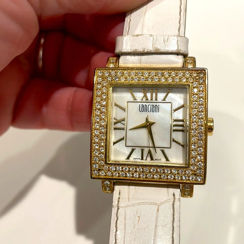 Lanciani Stainless Steel watch with white leather band. GUC